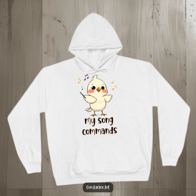 Funny hoodie with a determined bird conductor chirping musical cues with focused intensity, perfect for cozy listening sessions.