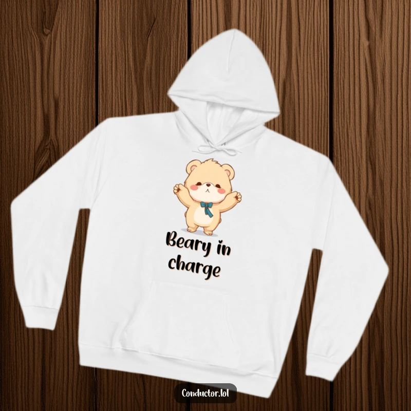 Funny hoodie featuring a fluffy bear character conducting music with a grand sweeping motion, offering warmth and humor.
