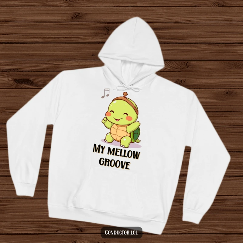 Funny hoodie with a joyful turtle conductor slowly guiding tempo with a contented smile, perfect for cozy relaxation.