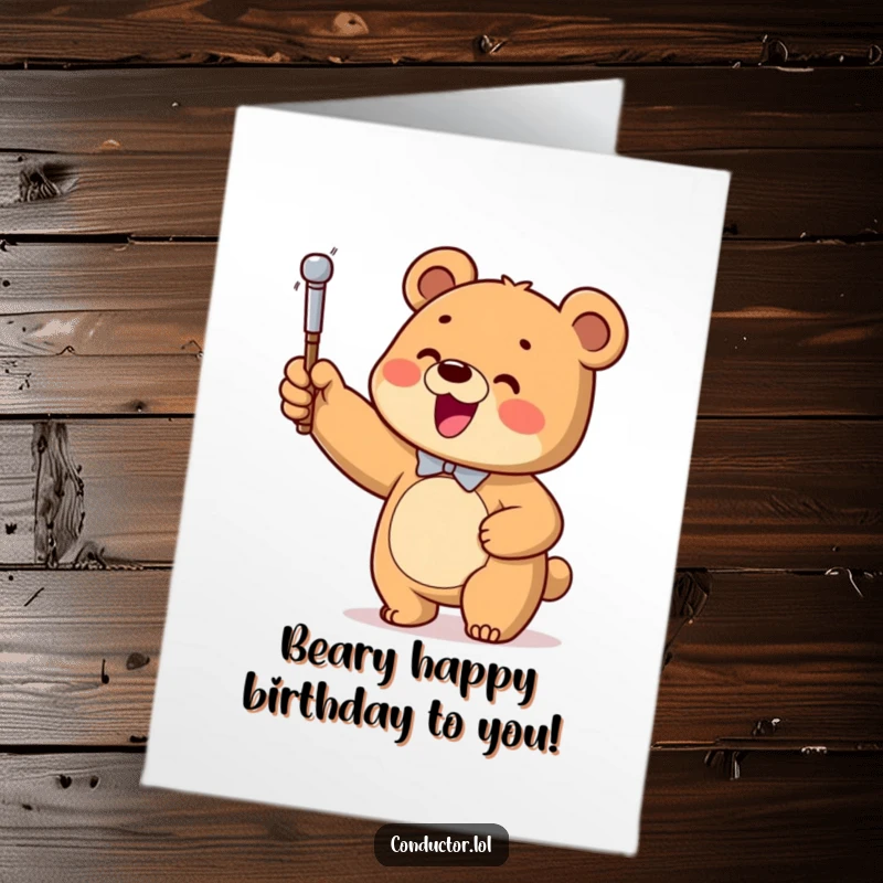 Funny Free Printable Birthday Card: A happy bear cub enthusiastically leading an imaginary orchestra with a conductor's baton.